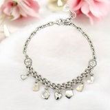 Purpleluck Ileana 925 Silver Charm Bracelet. Sterling Silver festive wear for women and girls. Gift for sister, wife and girlfriend