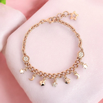 PurpleLuck Nancy Rose Gold Charm Bracelet. Sterling Silver minimal jewellery for women with star and moon charms