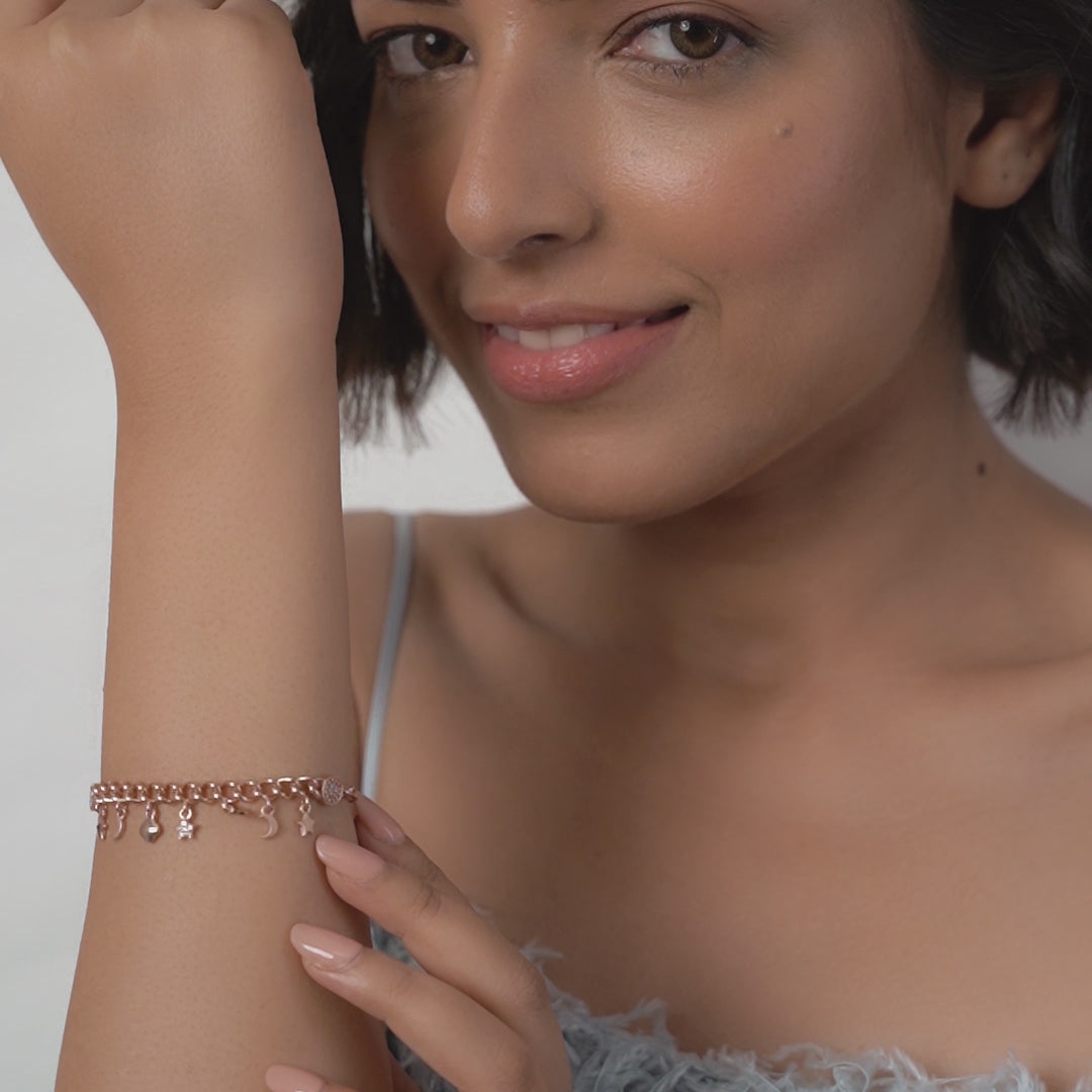 PurpleLuck Nancy Rose Gold Charm Bracelet. Sterling Silver minimal jewellery for women with star and moon charms