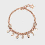 PurpleLuck Nancy Rose Gold Charm Bracelet. Sterling Silver minimal jewellery for women with star and moon charms
