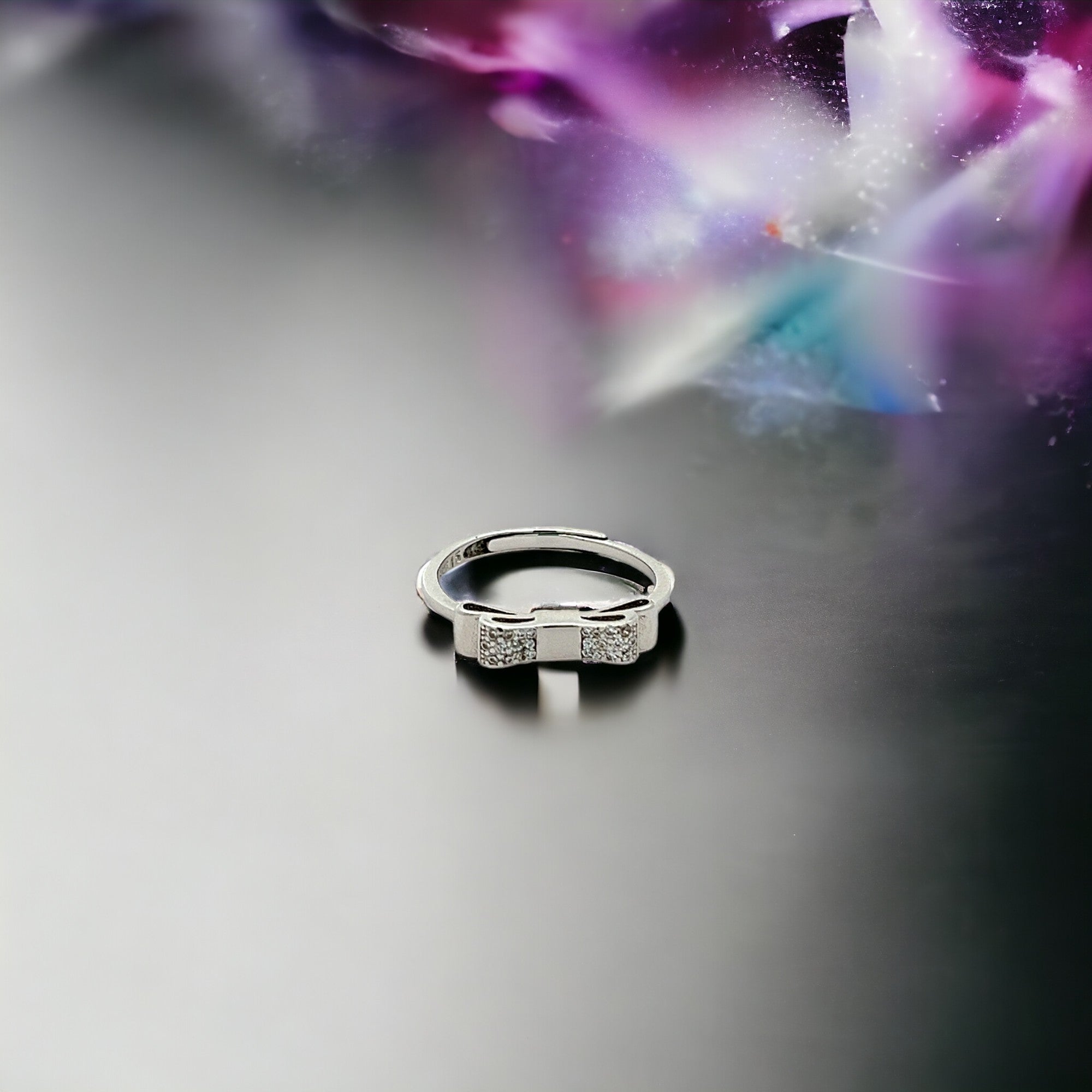 PurpleLuck Sienna 925 Silver Bow Ring. Cute and minimal design adjustable ring Perfect for gifting for girlfriend. Simple daily wear